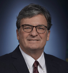 Secretary Mike Carroll