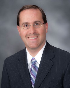 Commissioner Sean Logan