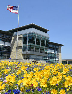 PA Turnpike location with field of wildflowers in front of building