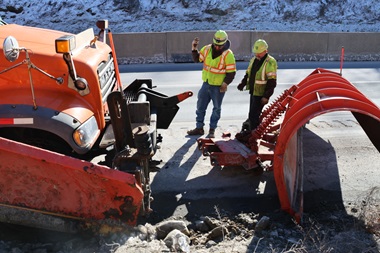 Repair on plow truck