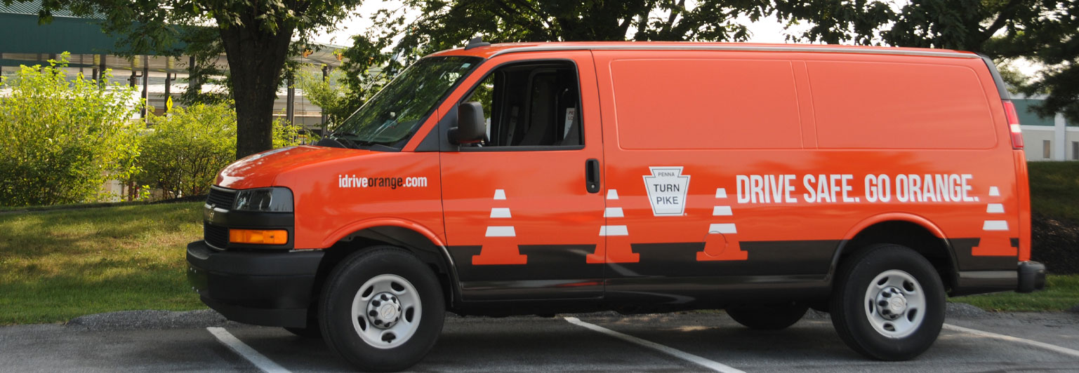 Drive Safe. Go Orange. Van with graphics