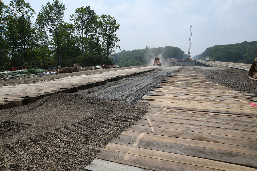 Widening for arch bridge construction