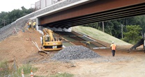 Contractor installing slope wall at new Richlieu Road Bridge eastbound abutment (Sept 2013)