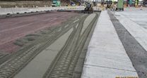 Placement of bedding material for precast pavement slabs (Mar/Jul 2019)