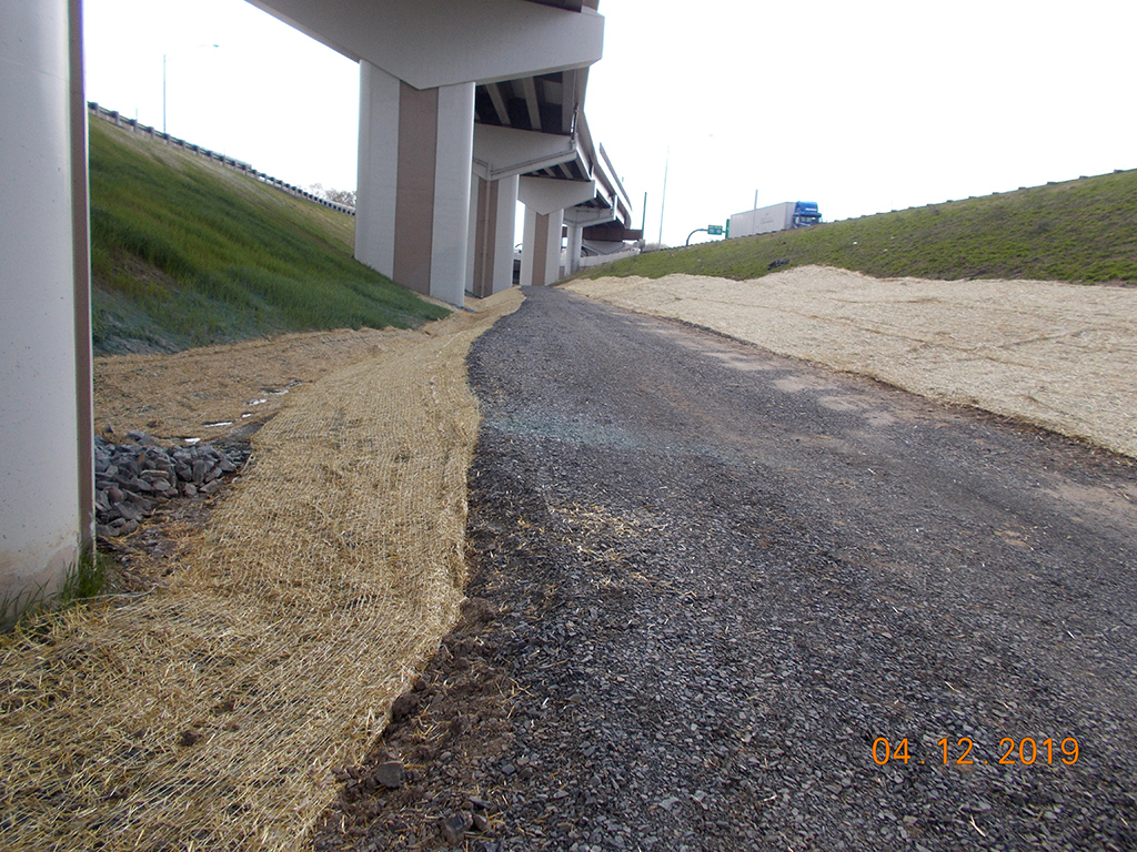 Installation of access road under flyover bridge (Mar/Jul 2019)
