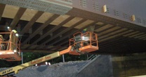 June 2015 Placing Underdeck Shielding on Existing Bridge