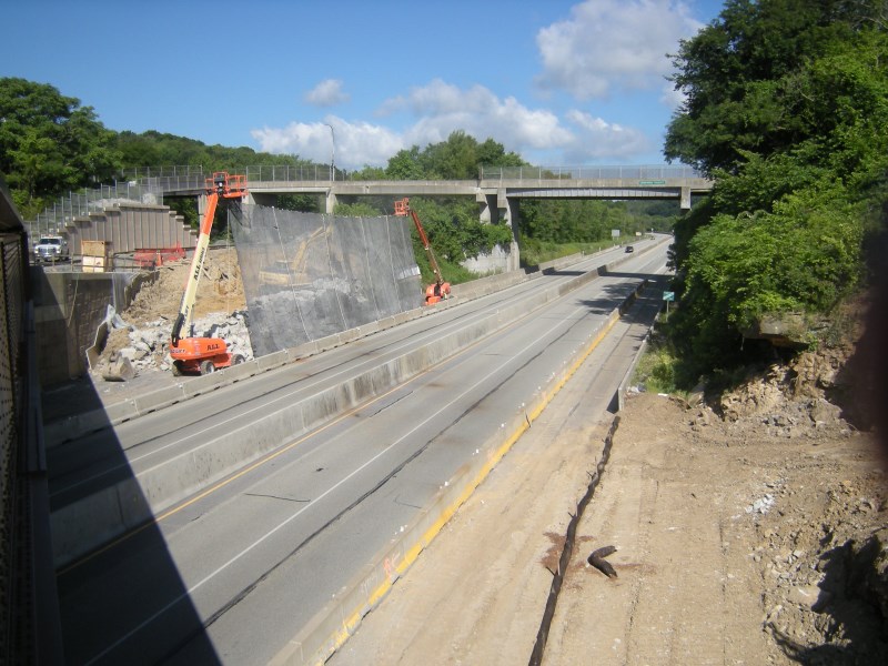 July 2015 207-WB Debris Net in Front of Existing Abutment 1 During Demolition