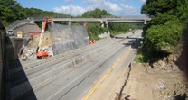 July 2015 207-WB Debris Net in Front of Existing Abutment 1 During Demolition