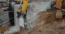 Bridge Construction excavator performing demolition