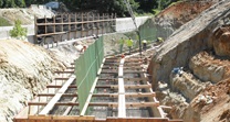 Construction workers pouring the footings for the new Valley Hill Road Bridge. June 2013.
