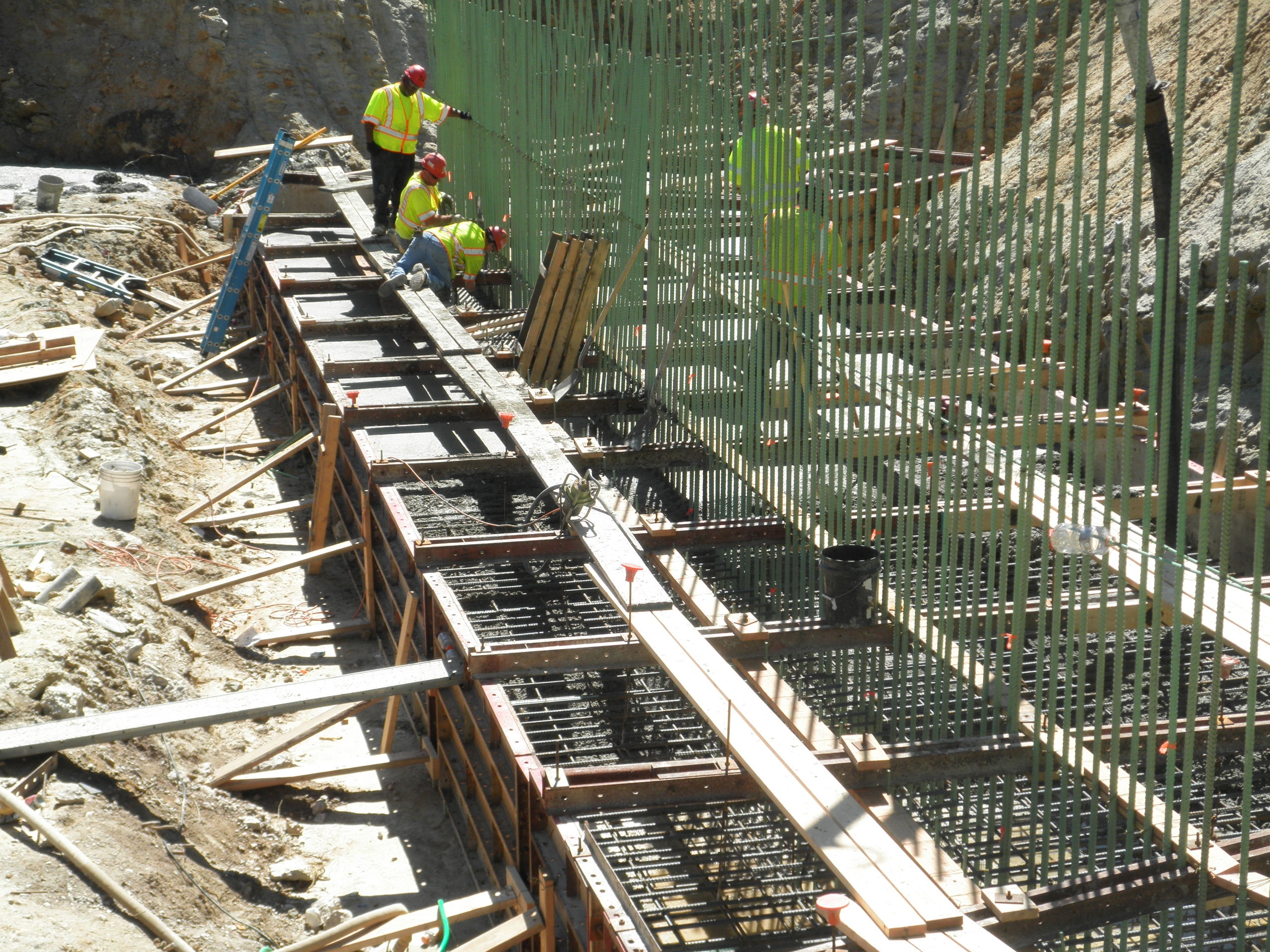Construction workers pouring the footings for the new Valley Hill Road Bridge. June 2013.