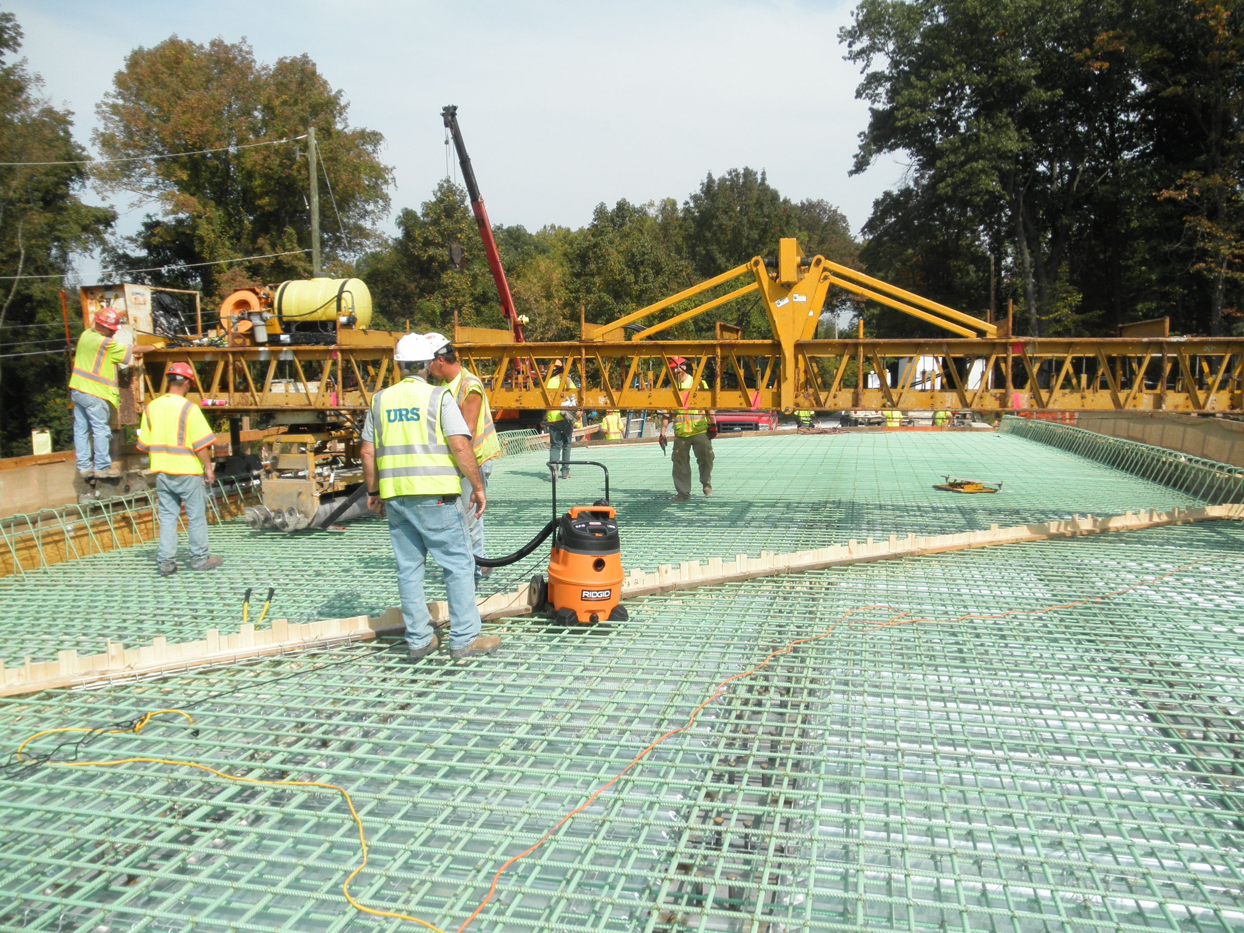 Construction workers preparing the deck of the new Valley Hill Road Bridge
