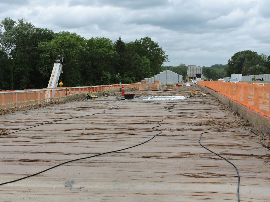Curing new pavement on 422 bridge