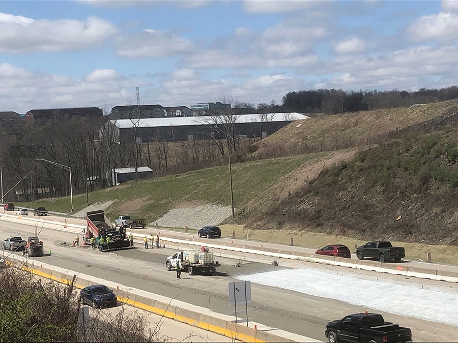 Placing cement treated permeable base on I-79 SB